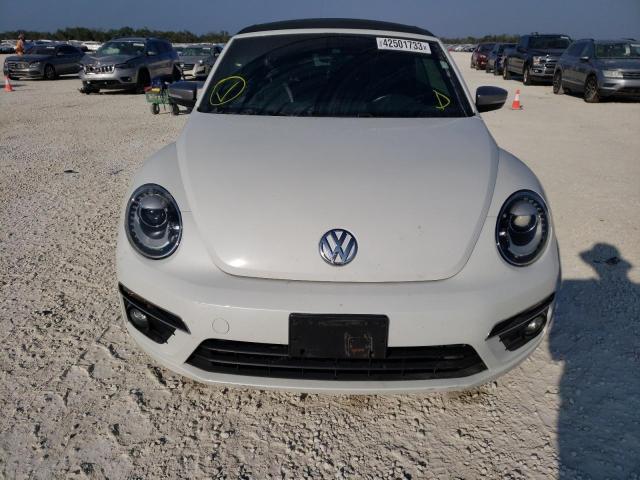 Photo 5 from auction – 2014 VOLKSWAGEN BEETLE with VIN 3VW5L7AT7EM817854
