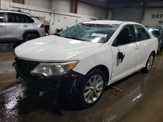 TOYOTA CAMRY HYBR 2014 with VIN 4T1BD1FK4EU126207 - Photo from auction