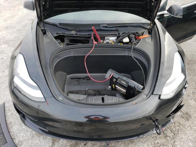Photo 11 from auction – 2019 TESLA MODEL 3 with VIN 5YJ3E1EA1KF410557