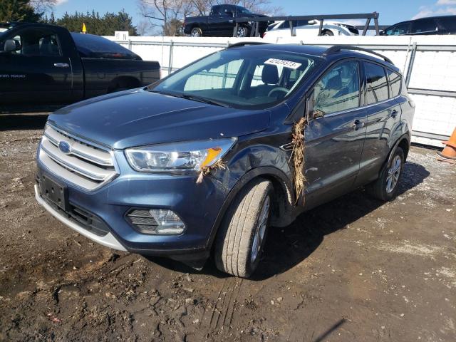 FORD ESCAPE SE 2018 with VIN 1FMCU9GDXJUB19386 - Photo from auction