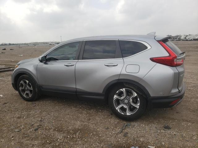 Photo 2 from auction – 2018 HONDA CR-V EX with VIN 7FARW1H55JE013281