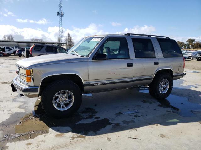 GMC YUKON 1999 with VIN 1GKEK13R5XJ754584 - Photo from auction