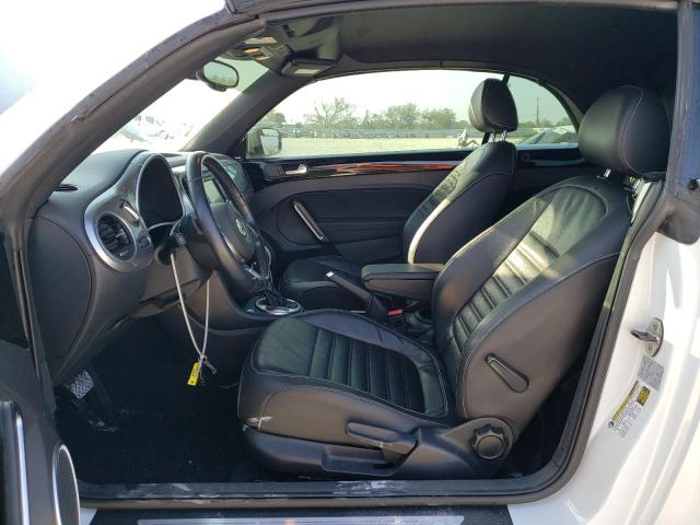 Photo 7 from auction – 2014 VOLKSWAGEN BEETLE with VIN 3VW5L7AT7EM817854