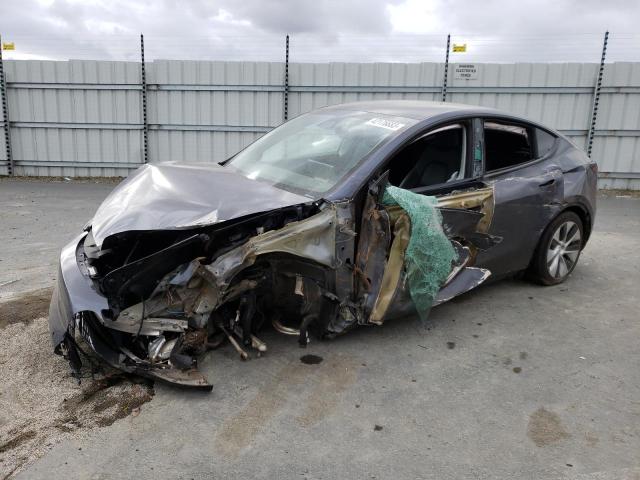 TESLA MODEL Y 2022 with VIN 7SAYGDEE1NF506720 - Photo from auction