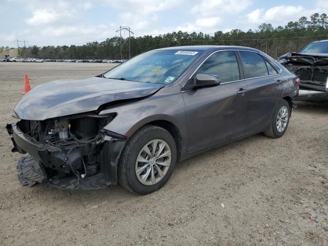 TOYOTA CAMRY LE 2017 with VIN 4T1BF1FK1HU623584 - Photo from auction