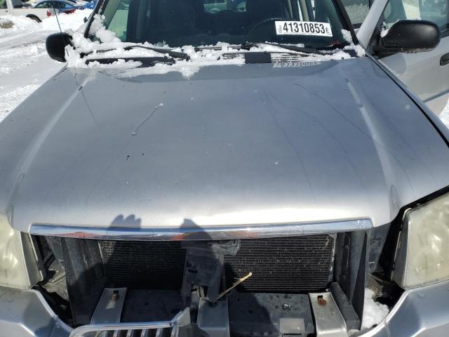 Photo 11 from auction – 2006 GMC ENVOY with VIN 1GKDT13S462110143