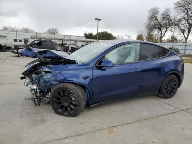 TESLA MODEL Y 2023 with VIN 7SAYGDEE3PF629583 - Photo from auction