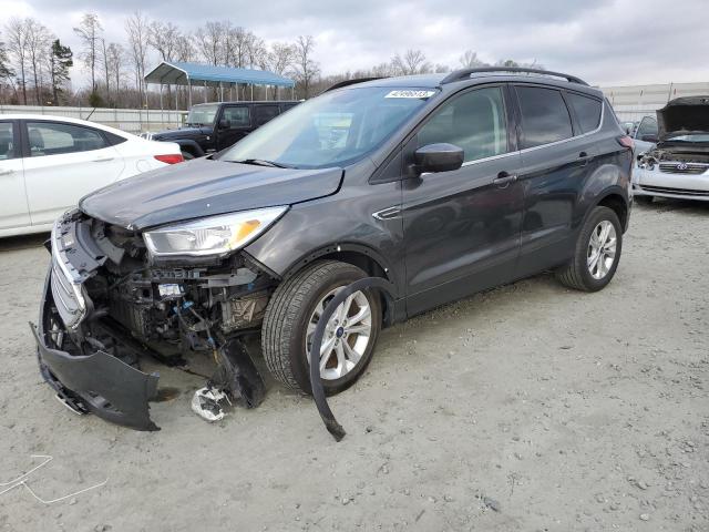 FORD ESCAPE SE 2018 with VIN 1FMCU0GD2JUC13130 - Photo from auction