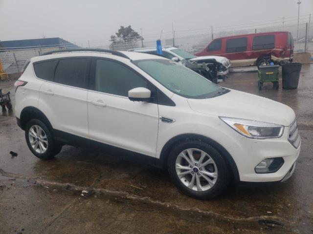 Photo 4 from auction – 2018 FORD ESCAPE SE with VIN 1FMCU0GD5JUD18289