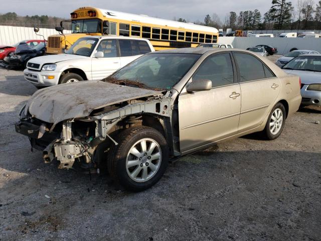 TOYOTA CAMRY LE 2004 with VIN 4T1BF30K44U589073 - Photo from auction