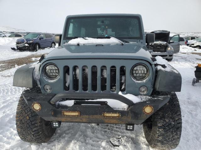 Photo 5 from auction – 2015 JEEP WRANGLER U with VIN 1C4BJWDG9FL644572