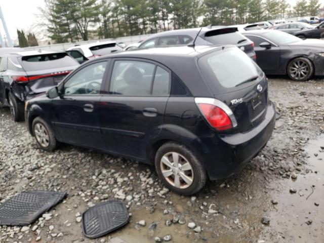 Photo 2 from auction – 2011 KIA RIO BASE with VIN KNADH5A30B6767750