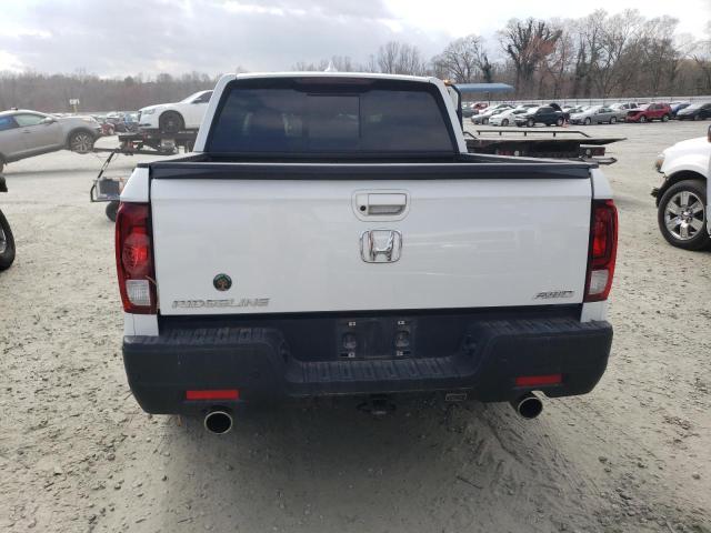 Photo 6 from auction – 2022 HONDA RIDGELINE with VIN 5FPYK3F79NB007970