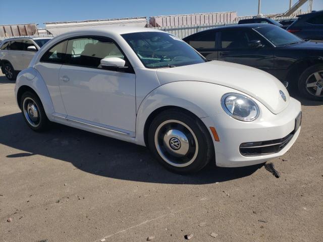 Photo 4 from auction – 2012 VOLKSWAGEN BEETLE with VIN 3VWJX7AT4CM634475