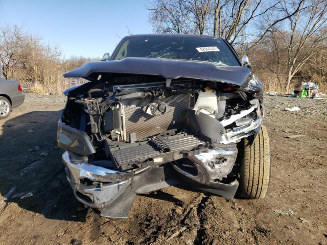 Photo 5 from auction – 2021 RAM 1500 LARAM with VIN 1C6SRFJM2MN830188