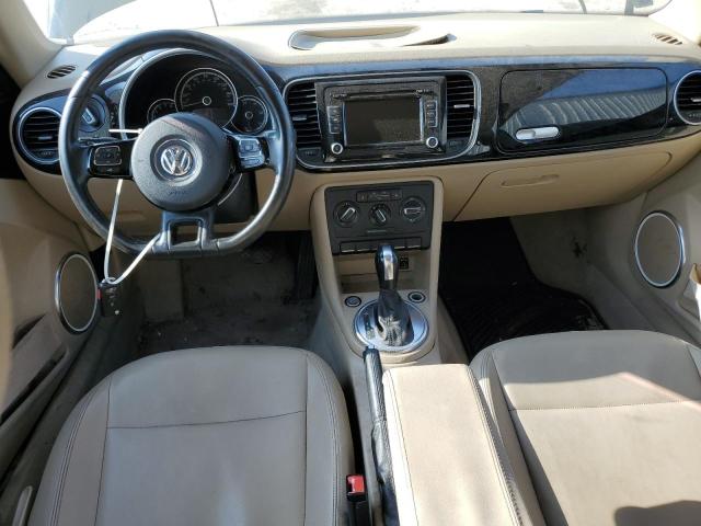 Photo 8 from auction – 2013 VOLKSWAGEN BEETLE with VIN 3VWJX7AT2DM646559