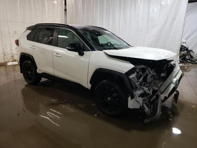 Photo 4 from auction – 2022 TOYOTA RAV4 XSE with VIN 4T3E6RFV0NU095920