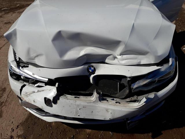 Photo 11 from auction – 2018 BMW 330 I with VIN WBA8B9G55JNU99558
