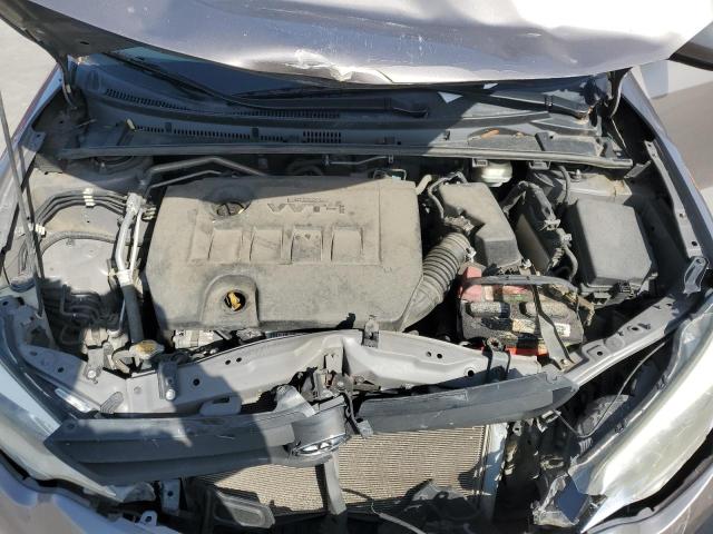 Photo 11 from auction – 2014 TOYOTA COROLLA L with VIN 2T1BURHEXEC171272