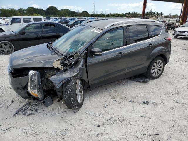FORD ESCAPE TIT 2017 with VIN 1FMCU0JD6HUC31519 - Photo from auction