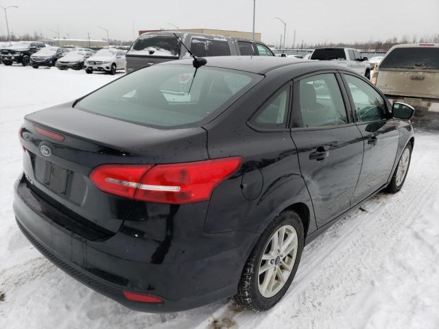 Photo 3 from auction – 2018 FORD FOCUS SE with VIN 1FADP3F2XJL295511
