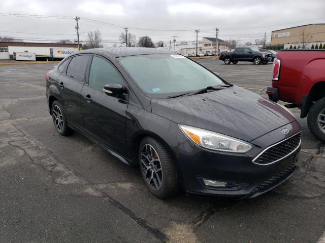 Photo 4 from auction – 2015 FORD FOCUS SE with VIN 1FADP3F25FL273455