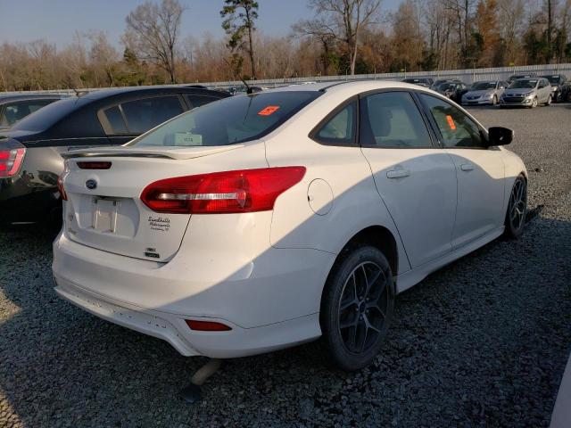 Photo 3 from auction – 2015 FORD FOCUS SE with VIN 1FADP3FE4FL321554
