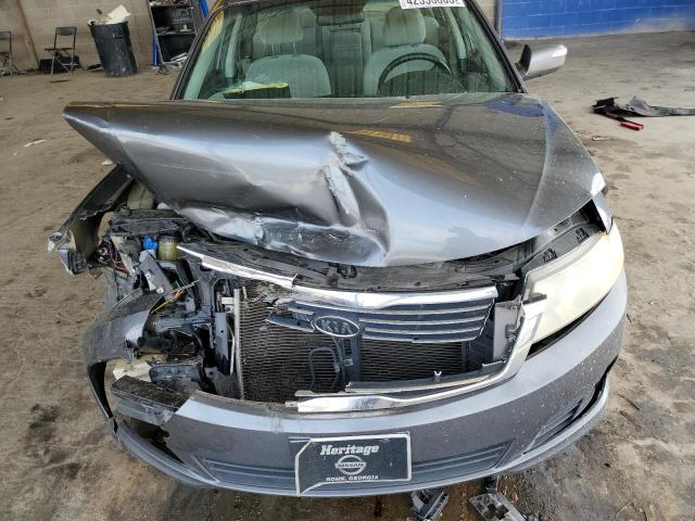 Photo 11 from auction – 2009 KIA OPTIMA LX with VIN KNAGE228395302748