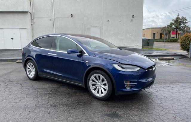 TESLA MODEL X 2016 with VIN 5YJXCAE29GF031944 - Photo from auction