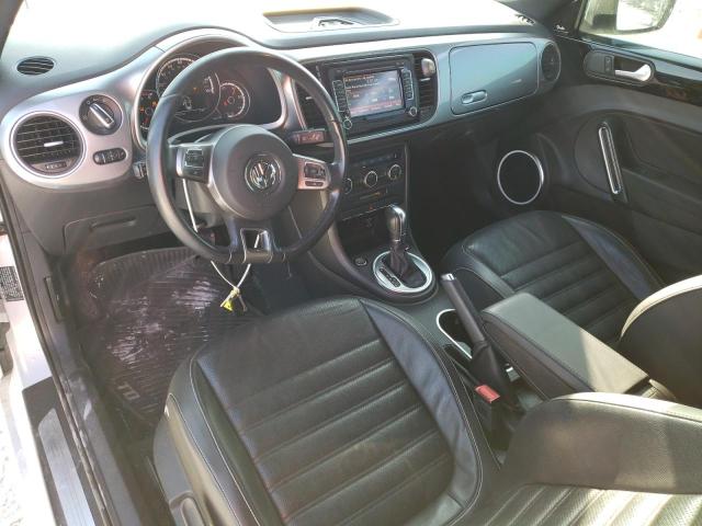 Photo 8 from auction – 2014 VOLKSWAGEN BEETLE with VIN 3VW5L7AT7EM817854