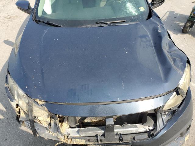 Photo 11 from auction – 2016 HONDA CIVIC LX with VIN 19XFC2F52GE024673