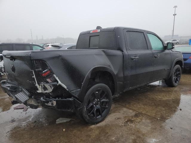 Photo 3 from auction – 2021 RAM 1500 LARAM with VIN 1C6SRFJT9MN642467