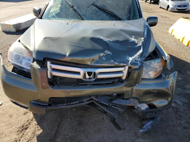 Photo 12 from auction – 2006 HONDA PILOT EX with VIN 5FNYF18516B011235
