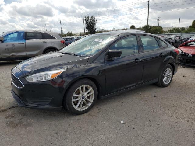 FORD FOCUS SE 2018 مع رقم تعريف المركبة 1FADP3FE0JL263922 - صورة من المزاد