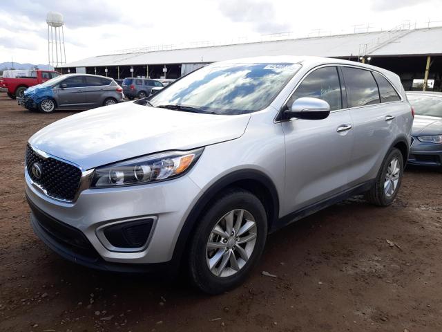 KIA SORENTO LX 2016 with VIN 5XYPG4A34GG156458 - Photo from auction