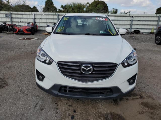 Photo 5 from auction – 2014 MAZDA CX-5 TOURI with VIN JM3KE2CY8E0364091