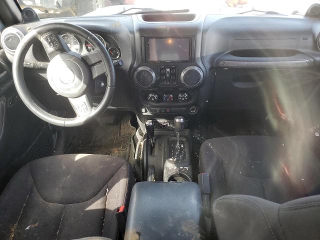 Photo 8 from auction – 2014 JEEP WRANGLER U with VIN 1C4BJWDG6EL155027