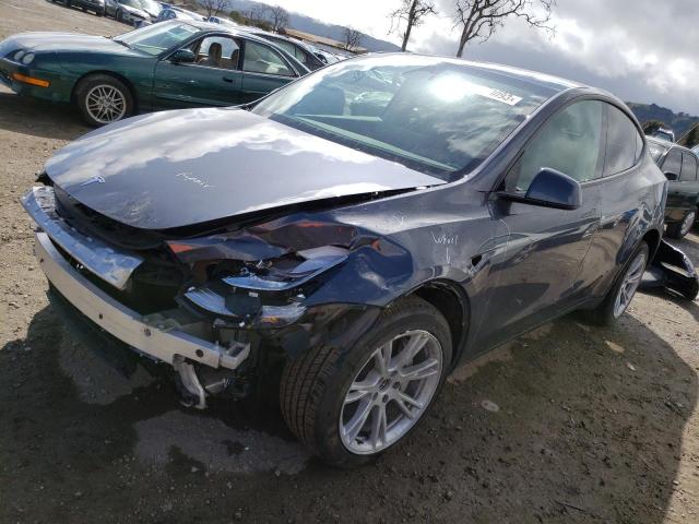TESLA MODEL Y 2023 with VIN 7SAYGDEE0PF599362 - Photo from auction
