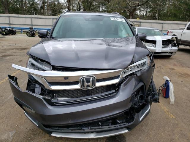 Photo 5 from auction – 2019 HONDA PILOT ELIT with VIN 5FNYF6H00KB004644