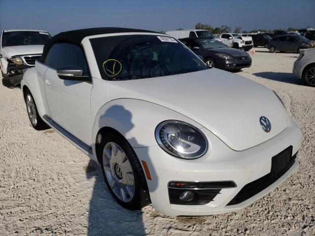 Photo 4 from auction – 2014 VOLKSWAGEN BEETLE with VIN 3VW5L7AT7EM817854