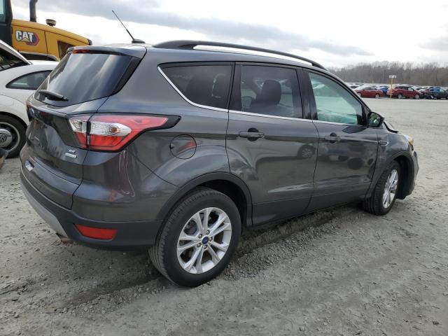 Photo 3 from auction – 2018 FORD ESCAPE SE with VIN 1FMCU0GD2JUC13130