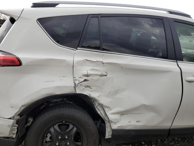 Photo 11 from auction – 2018 TOYOTA RAV4 LE with VIN JTMZFREV2JJ736187