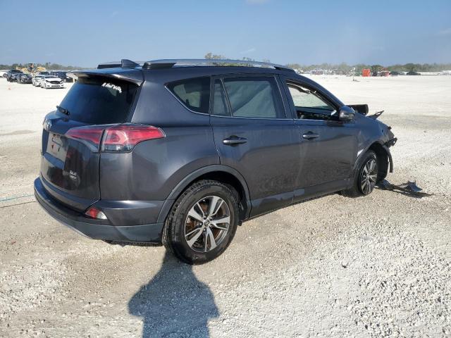 Photo 3 from auction – 2017 TOYOTA RAV4 XLE with VIN JTMRFREV5HJ703940