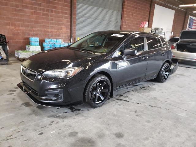 SUBARU IMPREZA 2019 with VIN 4S3GTAA60K1700340 - Photo from auction