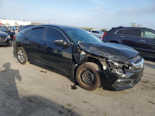 Photo 4 from auction – 2018 HONDA CIVIC LX with VIN 19XFC2F57JE008041
