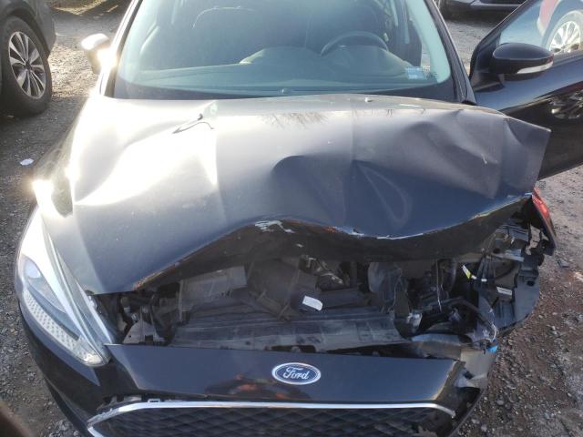 Photo 11 from auction – 2015 FORD FOCUS SE with VIN 1FADP3K29FL315955