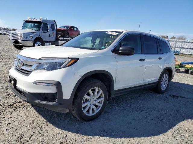 HONDA PILOT LX 2019 with VIN 5FNYF6H1XKB049633 - Photo from auction