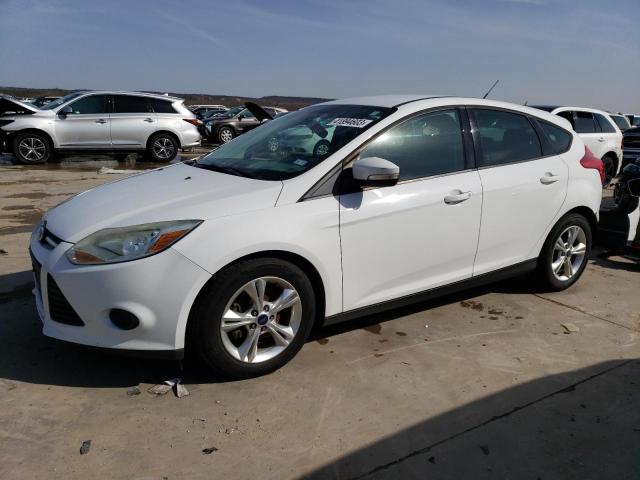 FORD FOCUS SE 2013 with VIN 1FADP3K22DL323215 - Photo from auction