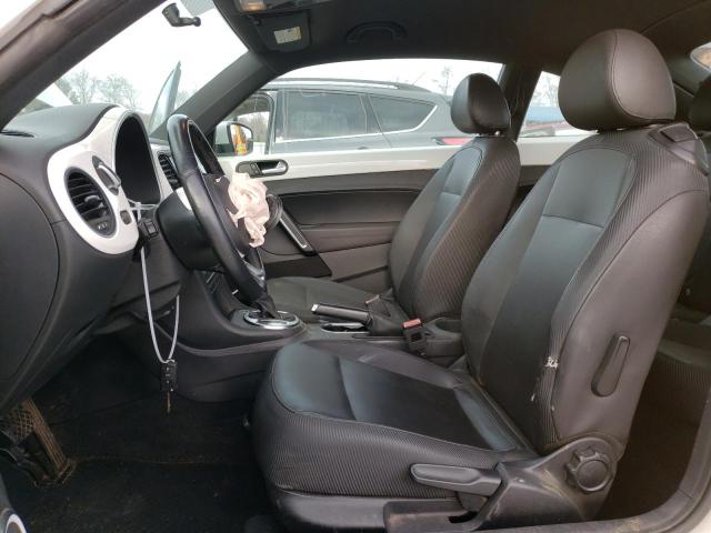 Photo 7 from auction – 2012 VOLKSWAGEN BEETLE with VIN 3VWJP7AT7CM641324