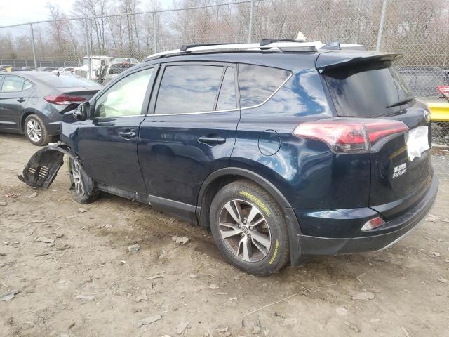 Photo 2 from auction – 2017 TOYOTA RAV4 XLE with VIN JTMRFREVXHJ113281